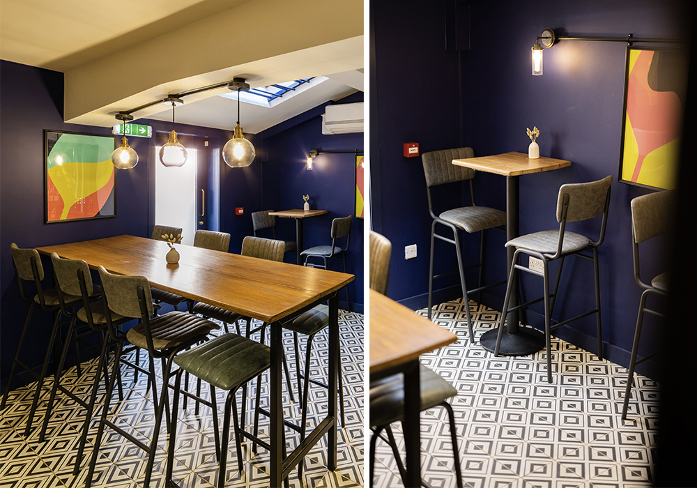 An illuminated bar setting with Brooklyn patterned floor tiles